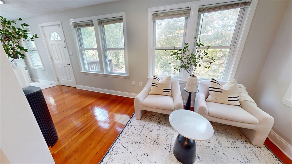 7 Penny Hill Road Melrose, MA 02176 - Photo 17 of 36 a living room with furniture and a large window