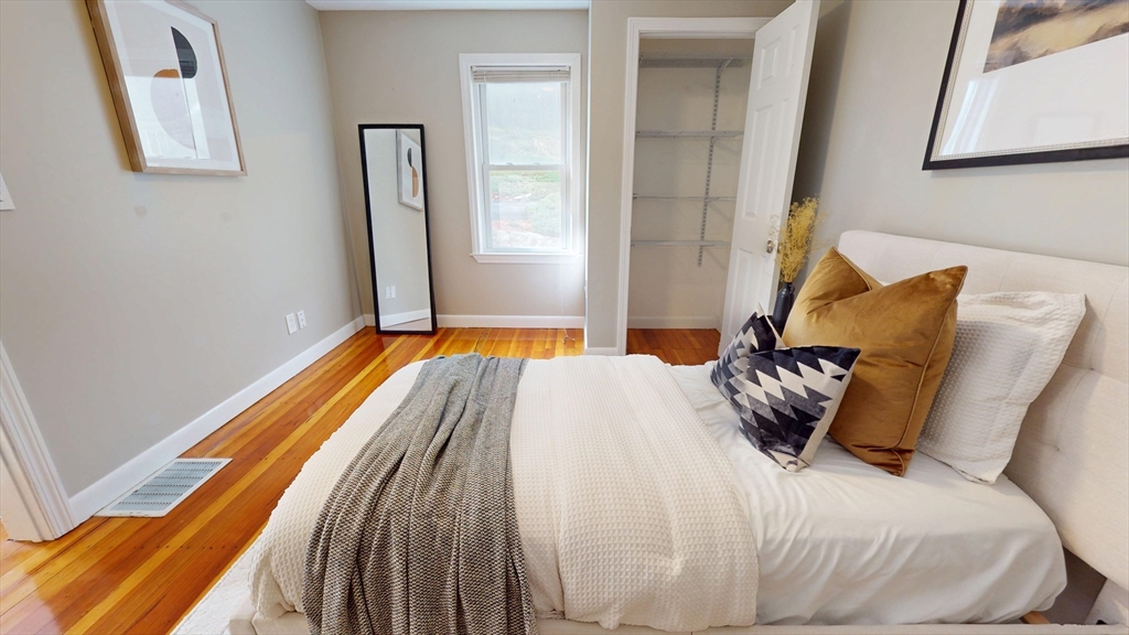 7 Penny Hill Road Melrose, MA 02176 - Photo 19 of 36 a bedroom with a bed and a window