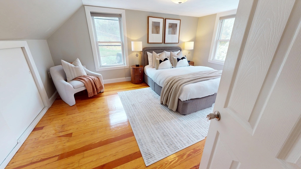 7 Penny Hill Road Melrose, MA 02176 - Photo 22 of 36 a bedroom with a bed couch and a window
