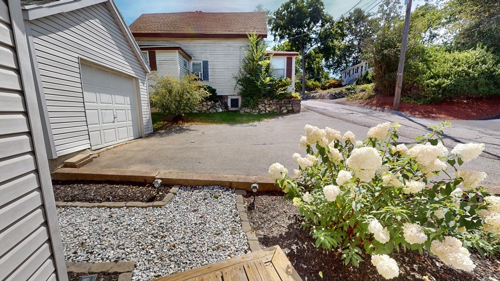 7 Penny Hill Road Melrose, MA 02176 - Photo 31 of 36 front view of a house with a yard