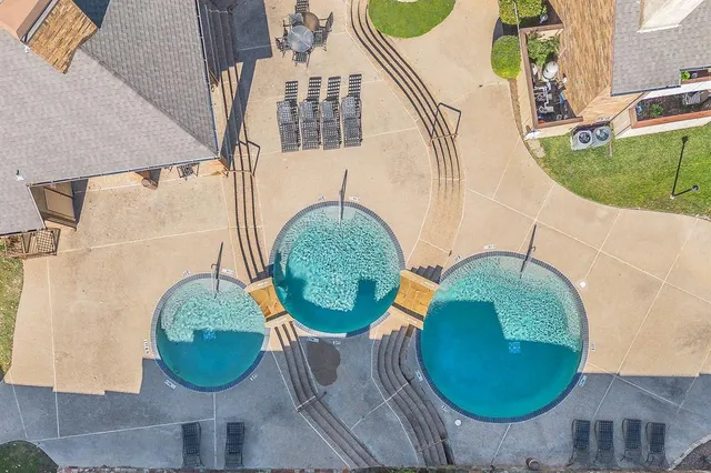 an aerial view of a highlighted house
