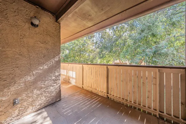 a view of a wooden fence