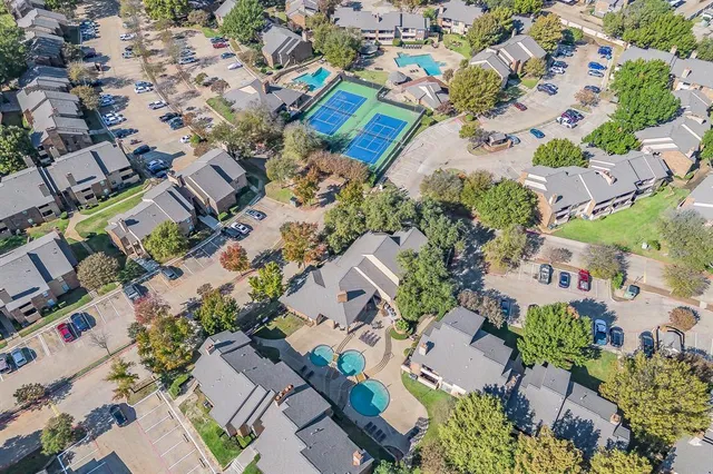 an aerial view of residential house with outdoor space