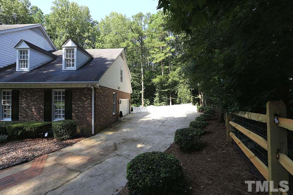 2308 Legacy Court Raleigh, NC 27615 - Photo 2 of 25 a view of a house with a yard