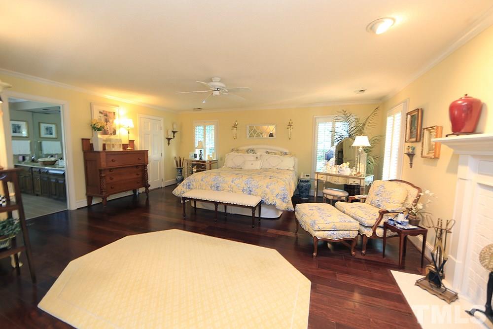 2308 Legacy Court Raleigh, NC 27615 - Photo 14 of 25 a living room with furniture and a wooden floor