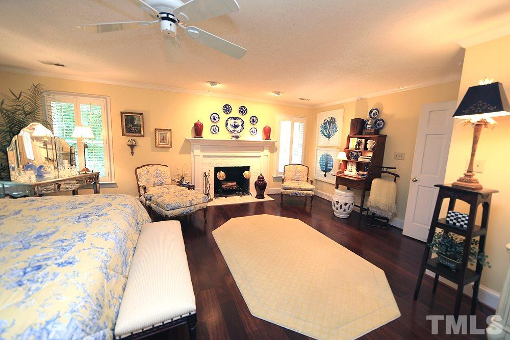 2308 Legacy Court Raleigh, NC 27615 - Photo 15 of 25 a living room with furniture and a fireplace