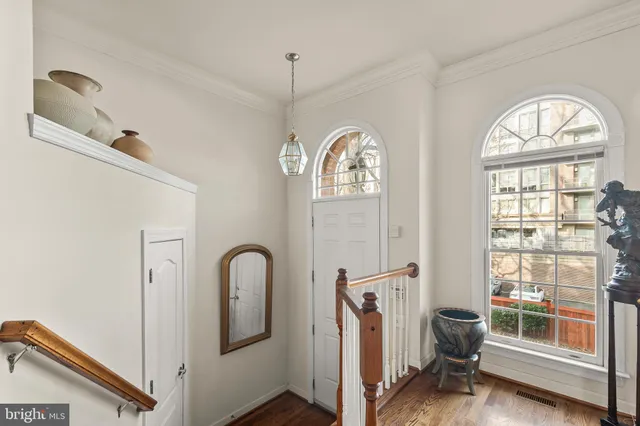 a view of a livingroom with furniture and a window