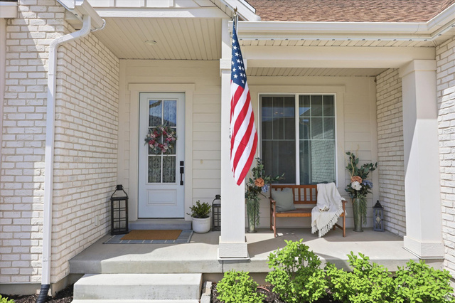 283 North 500 West Mapleton, UT 84664 - Photo 6 of 102 Doorway to property with brick siding and a beautiful porch.