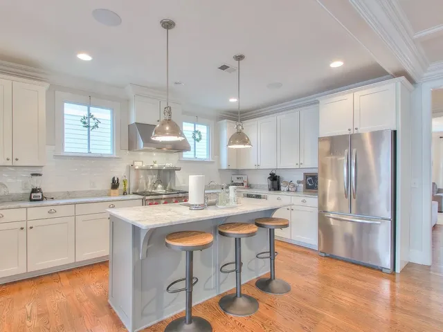 a bathroom with a sink vanity and a mirror