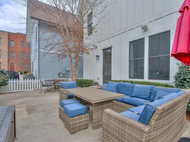 a view of a hallway to closet and wooden floor