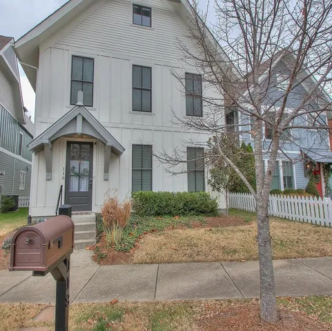 a view of a house with a garage