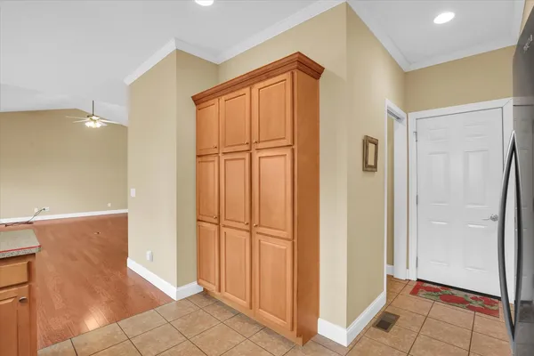 a view of a bathroom with wooden floor