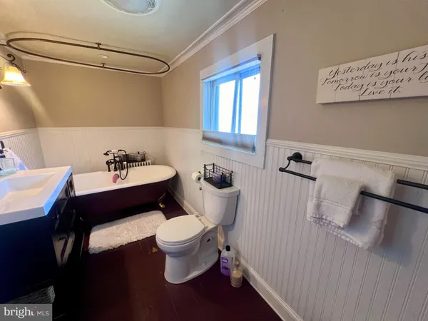 a bathroom with a sink and a toilet