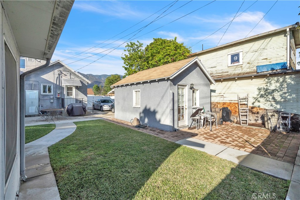 630 King Street Monrovia, CA 91016 - Photo 17 of 22 a view of a house with backyard and sitting area