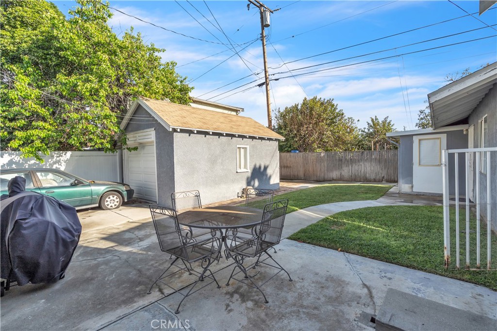 630 King Street Monrovia, CA 91016 - Photo 18 of 22 a view of a house with backyard and a patio