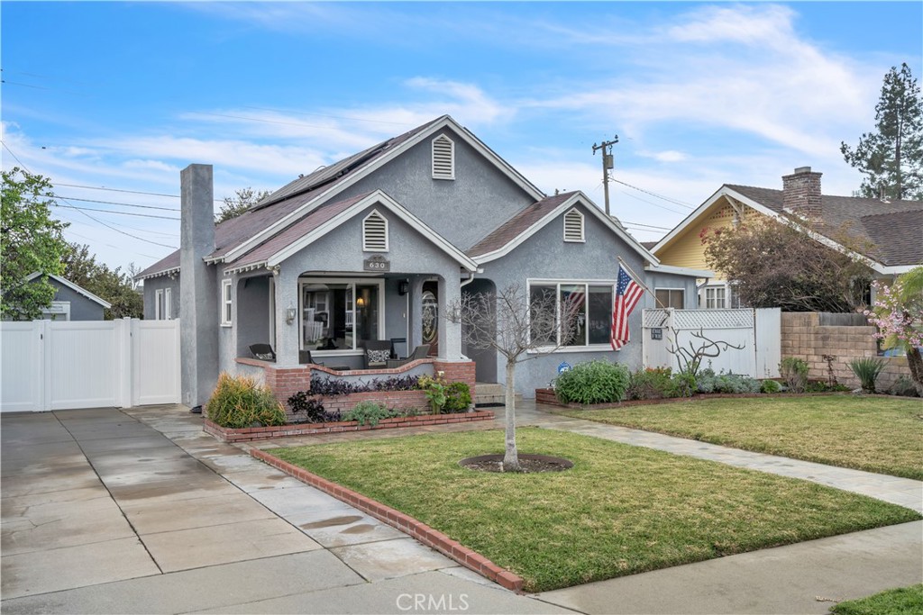 630 King Street Monrovia, CA 91016 - Photo 2 of 22 a front view of a house with garden and porch