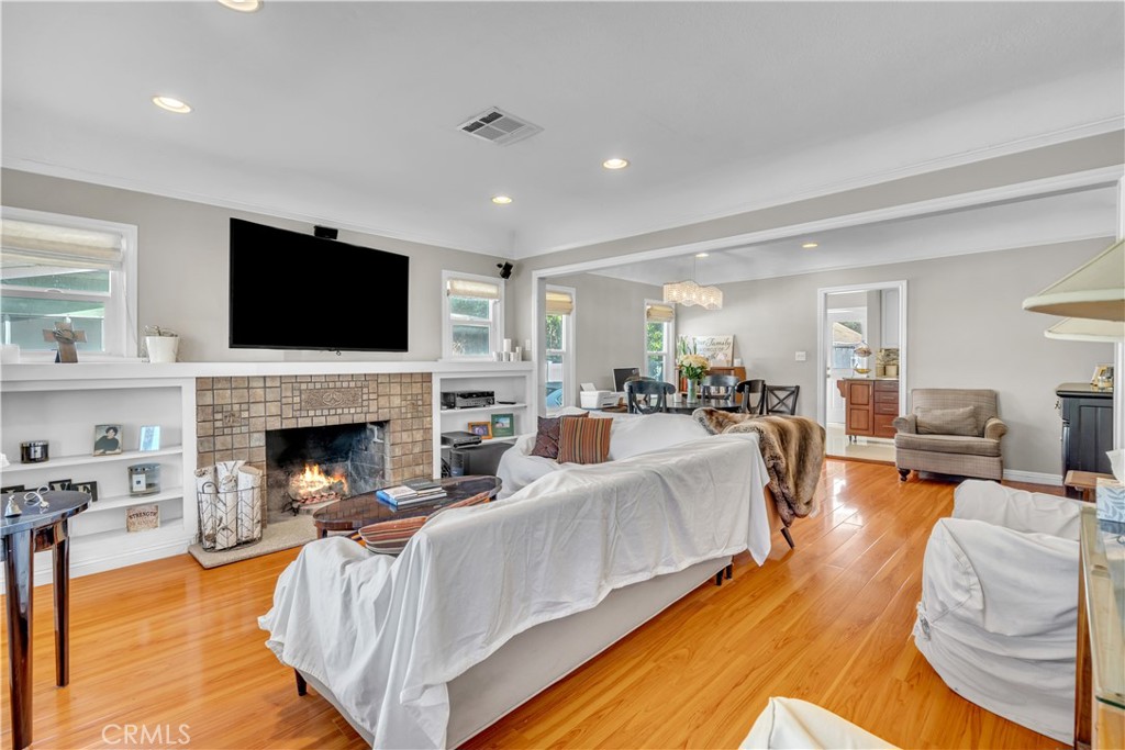 630 King Street Monrovia, CA 91016 - Photo 5 of 22 a living room with furniture fireplace and a flat screen tv