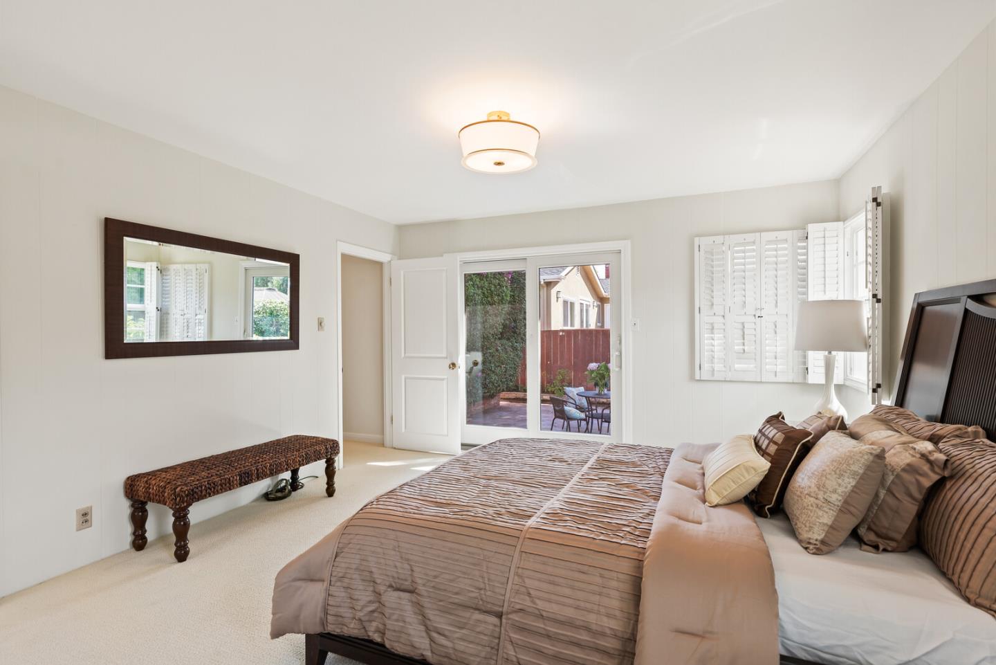 225 Victoria Road Burlingame, CA 94010 - Photo 17 of 29 a bedroom with a bed and a window