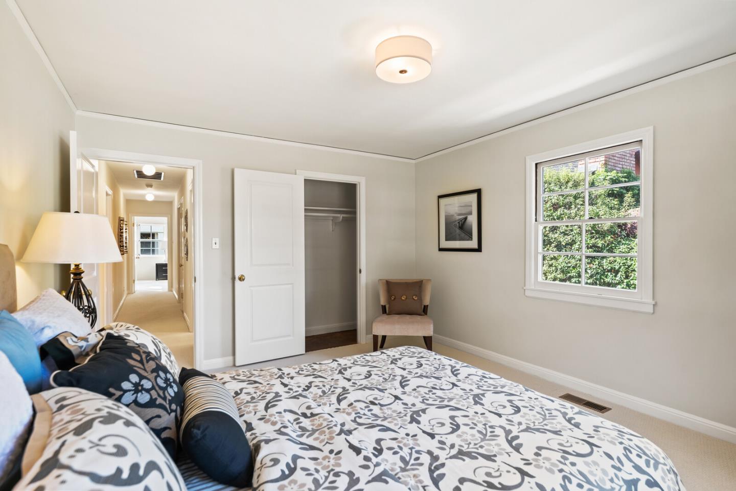225 Victoria Road Burlingame, CA 94010 - Photo 20 of 29 a bedroom with a bed and a window