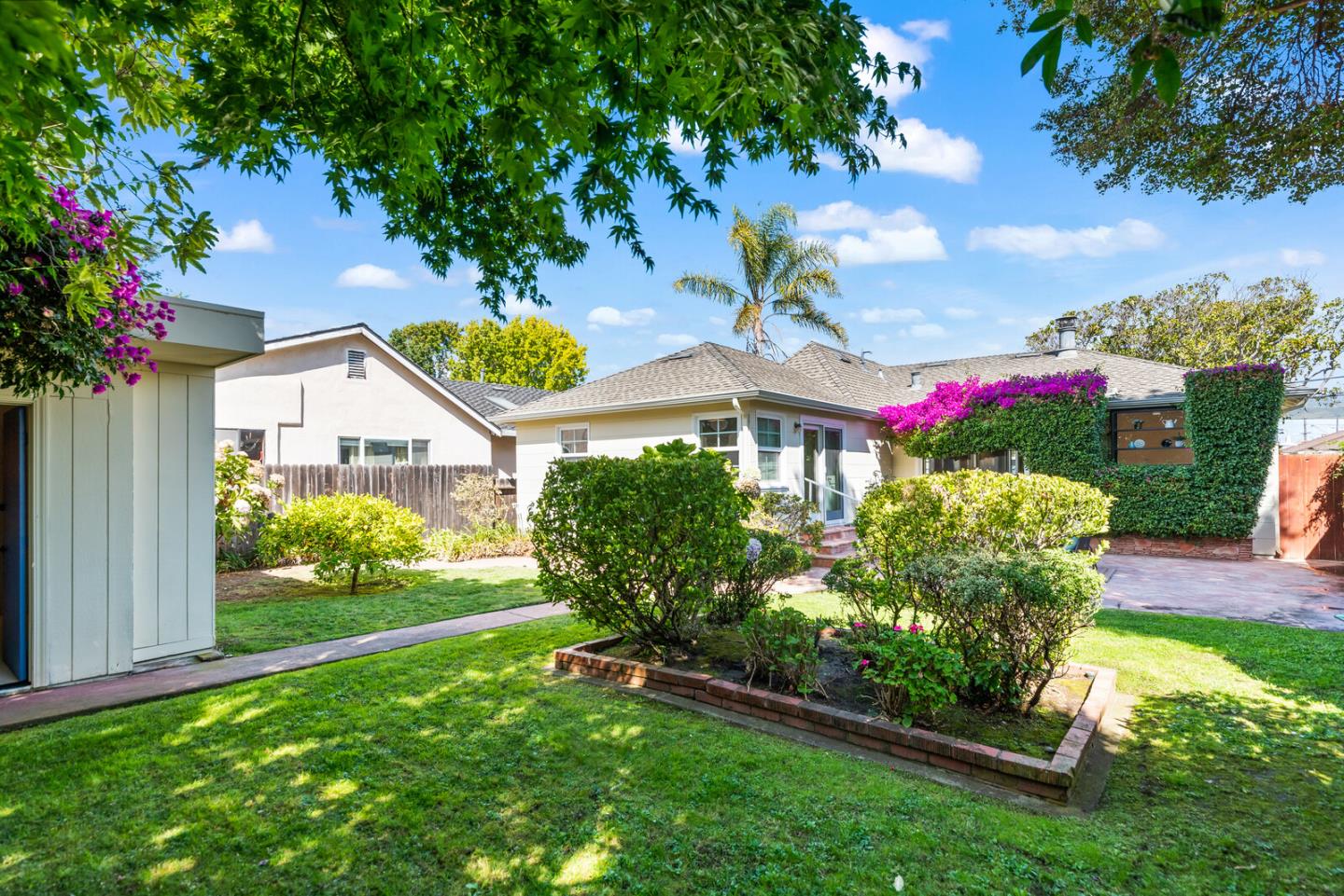 225 Victoria Road Burlingame, CA 94010 - Photo 29 of 29 a front view of a house with a yard