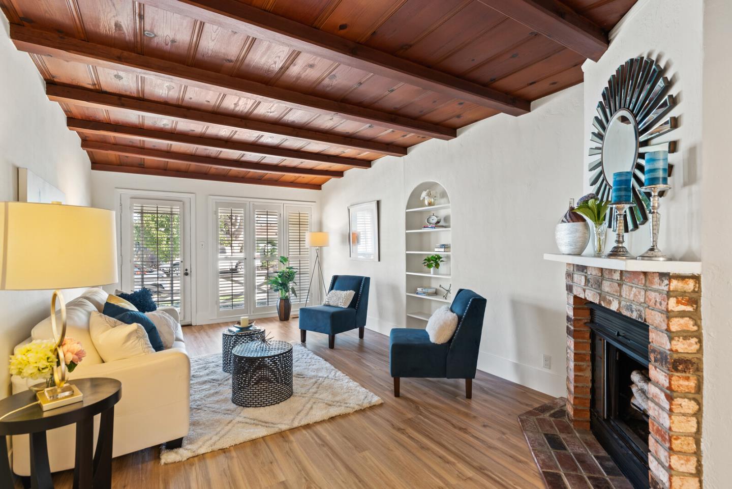 225 Victoria Road Burlingame, CA 94010 - Photo 5 of 29 a living room with furniture and a fireplace