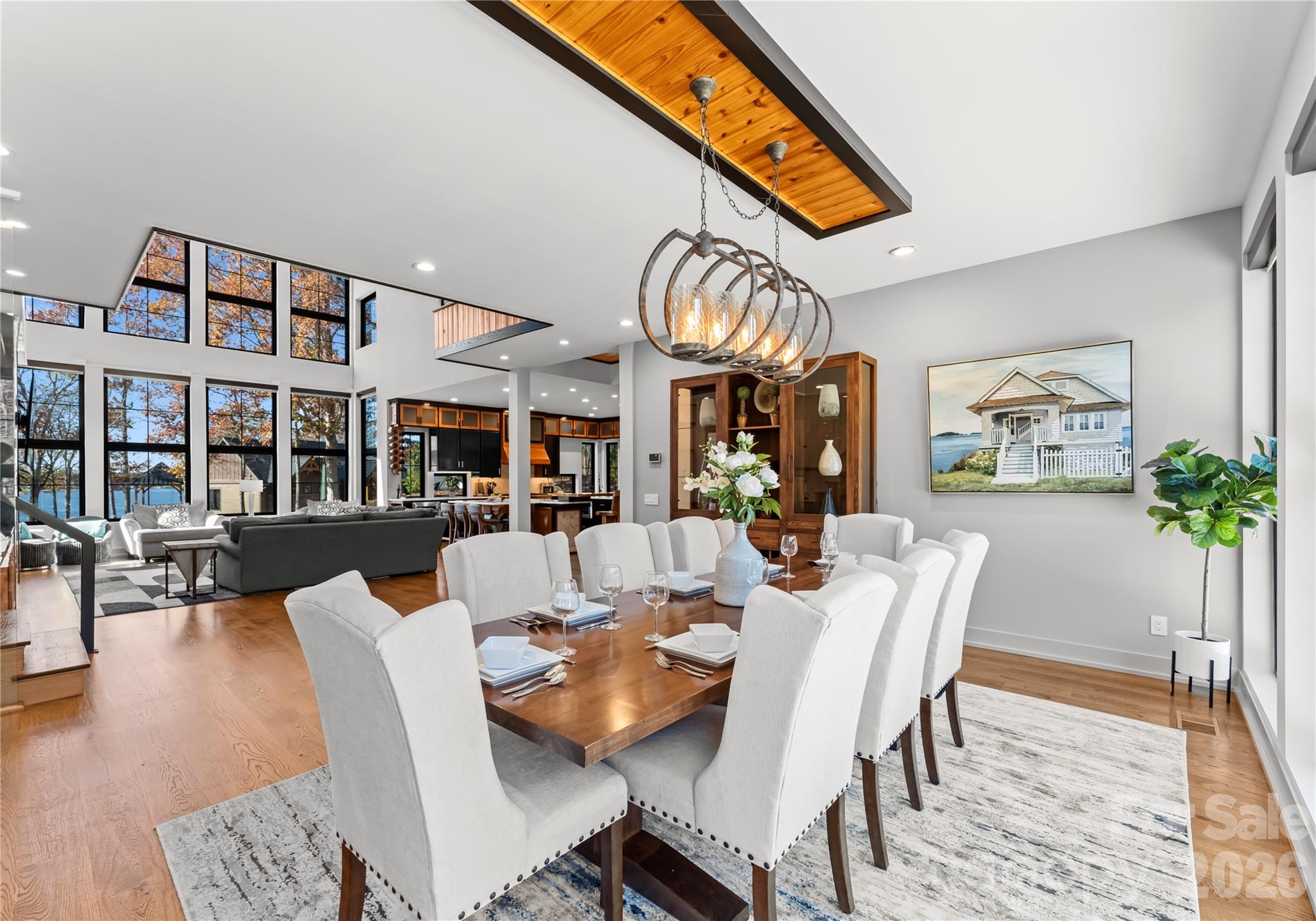 222 Greenbay Road Mooresville, NC 28117 - Photo 15 of 40 a view of a dining room with furniture window and wooden floor