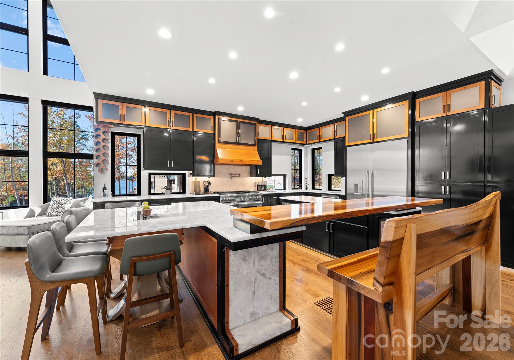 222 Greenbay Road Mooresville, NC 28117 - Photo 16 of 40 a kitchen with stainless steel appliances granite countertop wooden cabinets and sink
