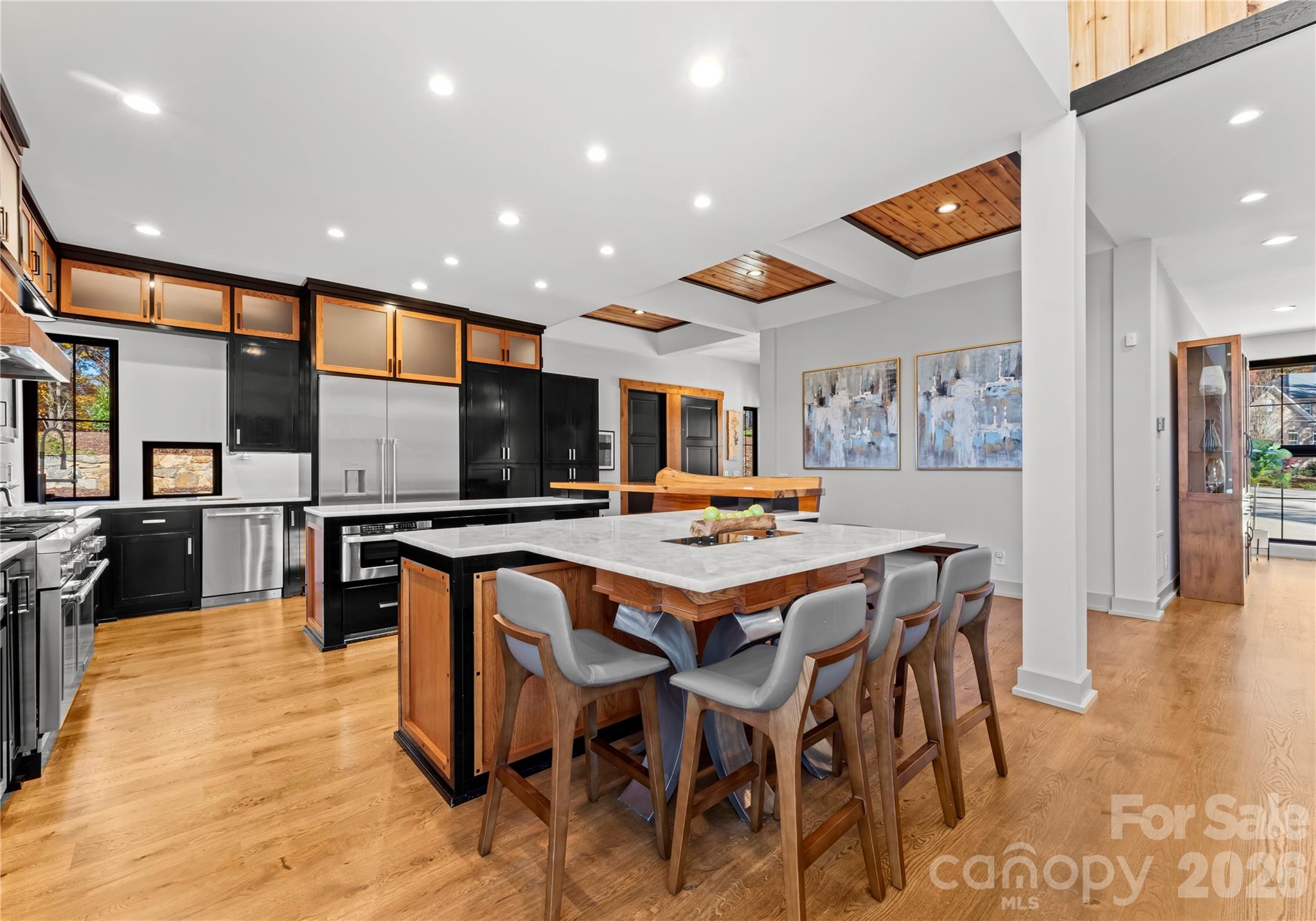222 Greenbay Road Mooresville, NC 28117 - Photo 18 of 40 a large kitchen with a table and chairs