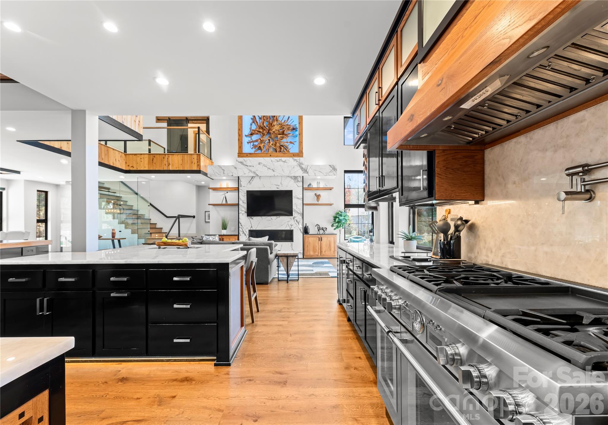 222 Greenbay Road Mooresville, NC 28117 - Photo 20 of 40 a kitchen with stainless steel appliances granite countertop a stove and a sink
