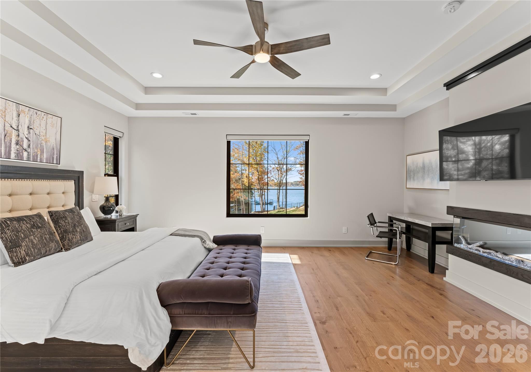 222 Greenbay Road Mooresville, NC 28117 - Photo 24 of 40 a bedroom with a bed and a couch