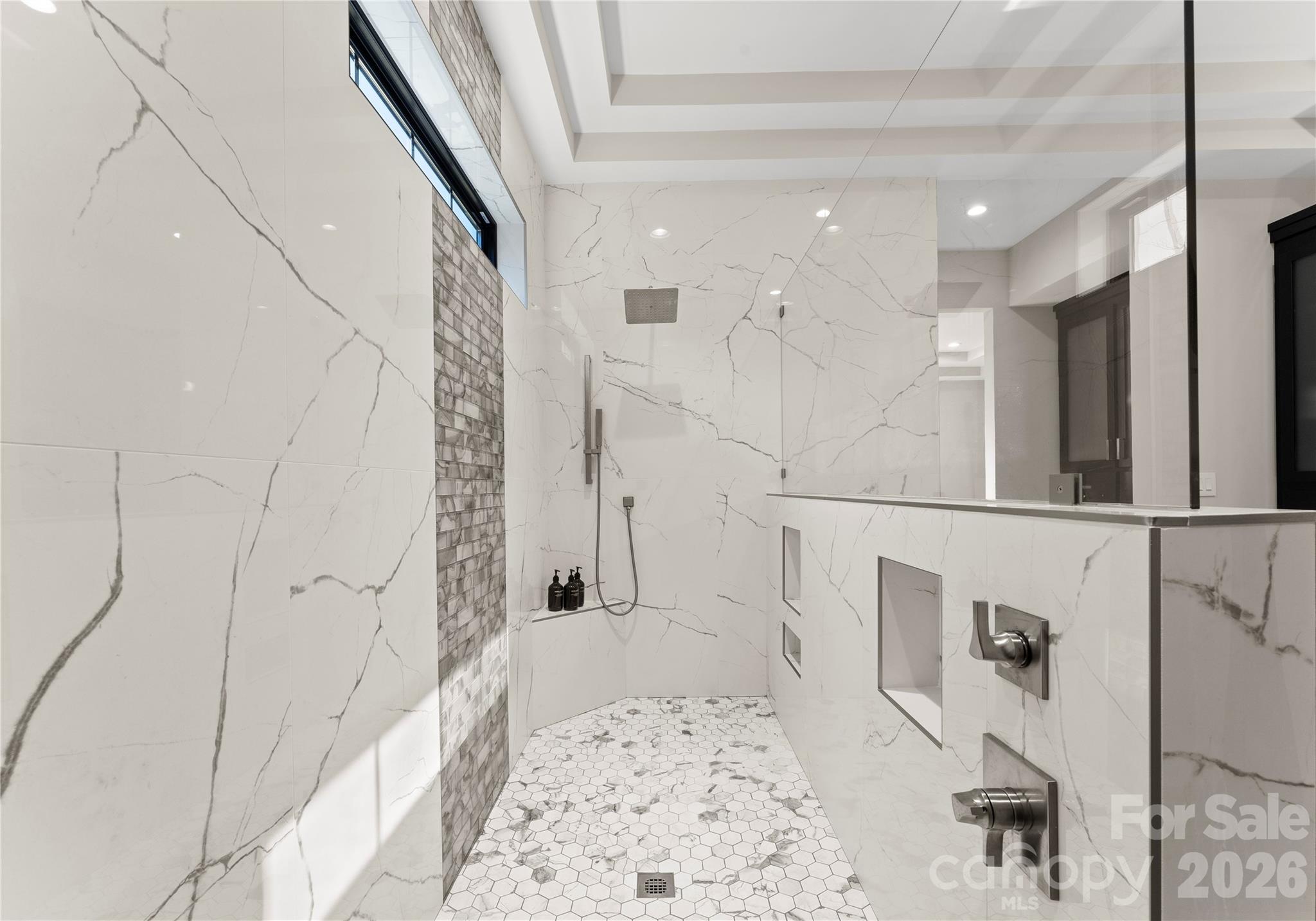 222 Greenbay Road Mooresville, NC 28117 - Photo 28 of 40 a bathroom with a bathtub and shower