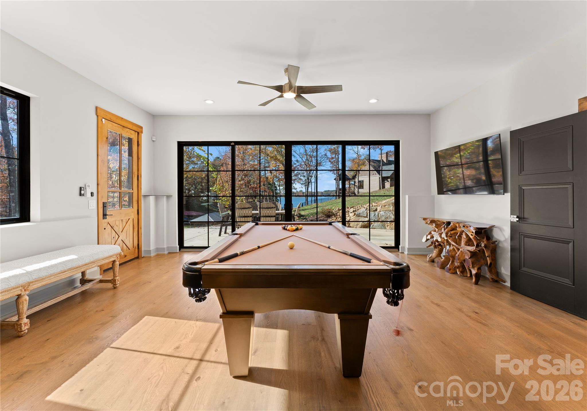222 Greenbay Road Mooresville, NC 28117 - Photo 29 of 40 a very nice looking living room with a large window and a flat screen tv