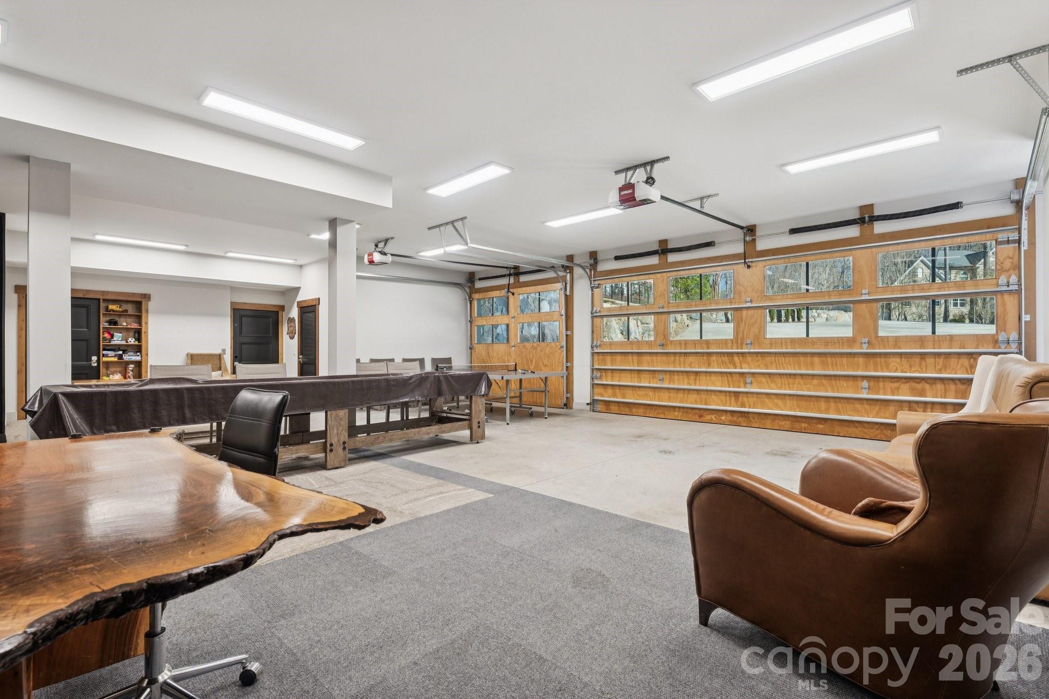 222 Greenbay Road Mooresville, NC 28117 - Photo 40 of 40 a living room with furniture and a flat screen tv