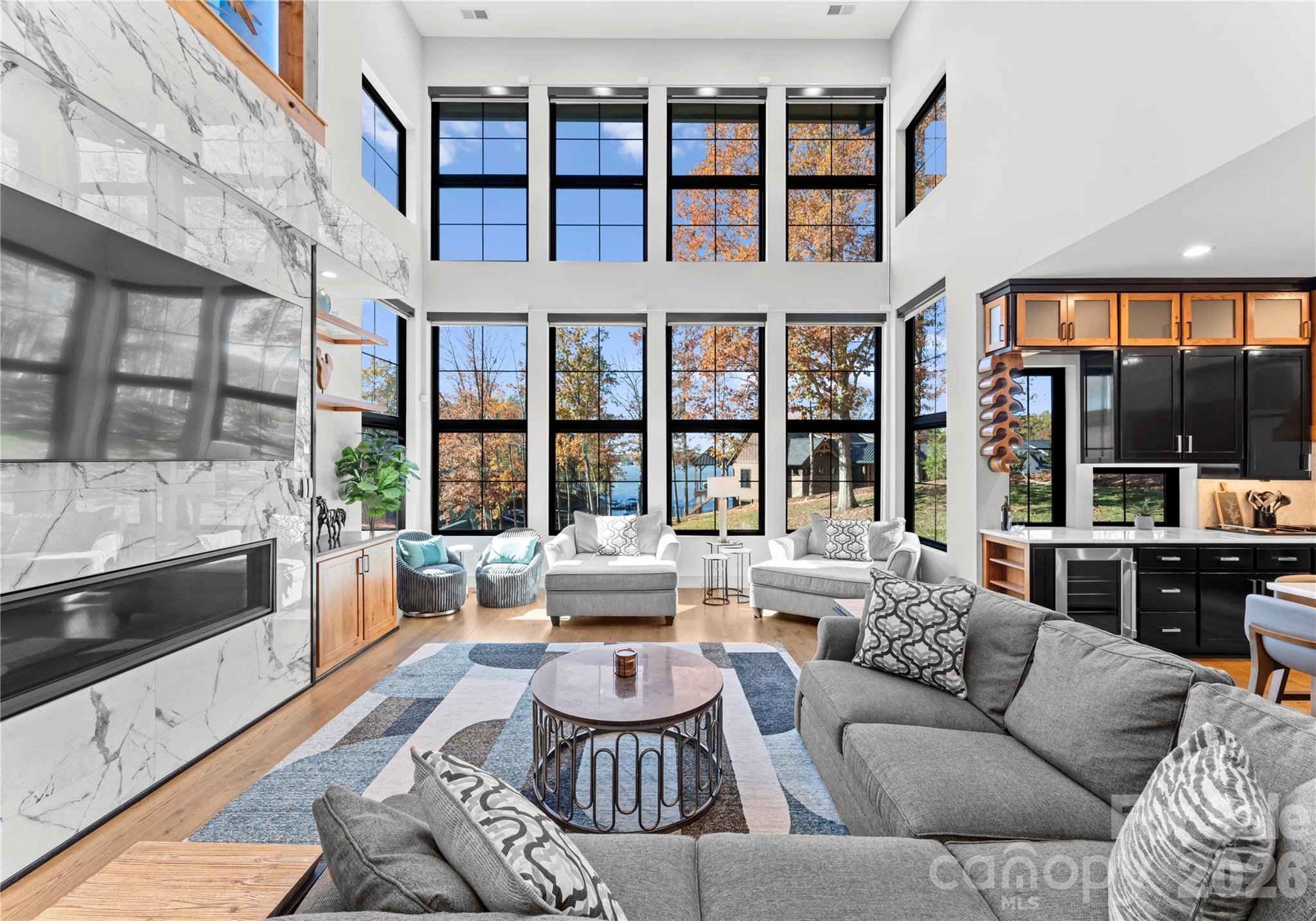 222 Greenbay Road Mooresville, NC 28117 - Photo 8 of 40 a living room with furniture fireplace and flat screen tv