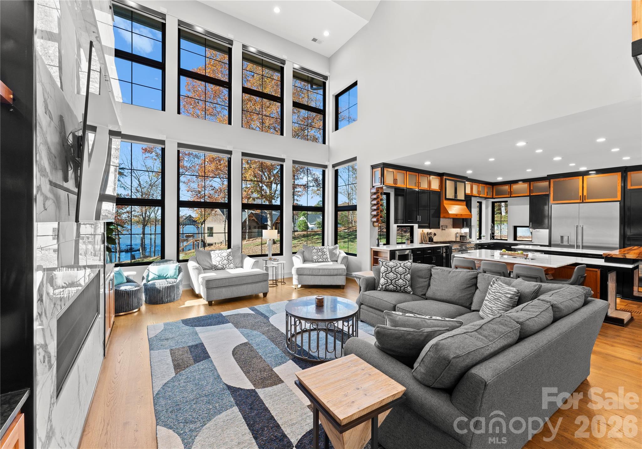 222 Greenbay Road Mooresville, NC 28117 - Photo 9 of 40 a living room with furniture and a large window