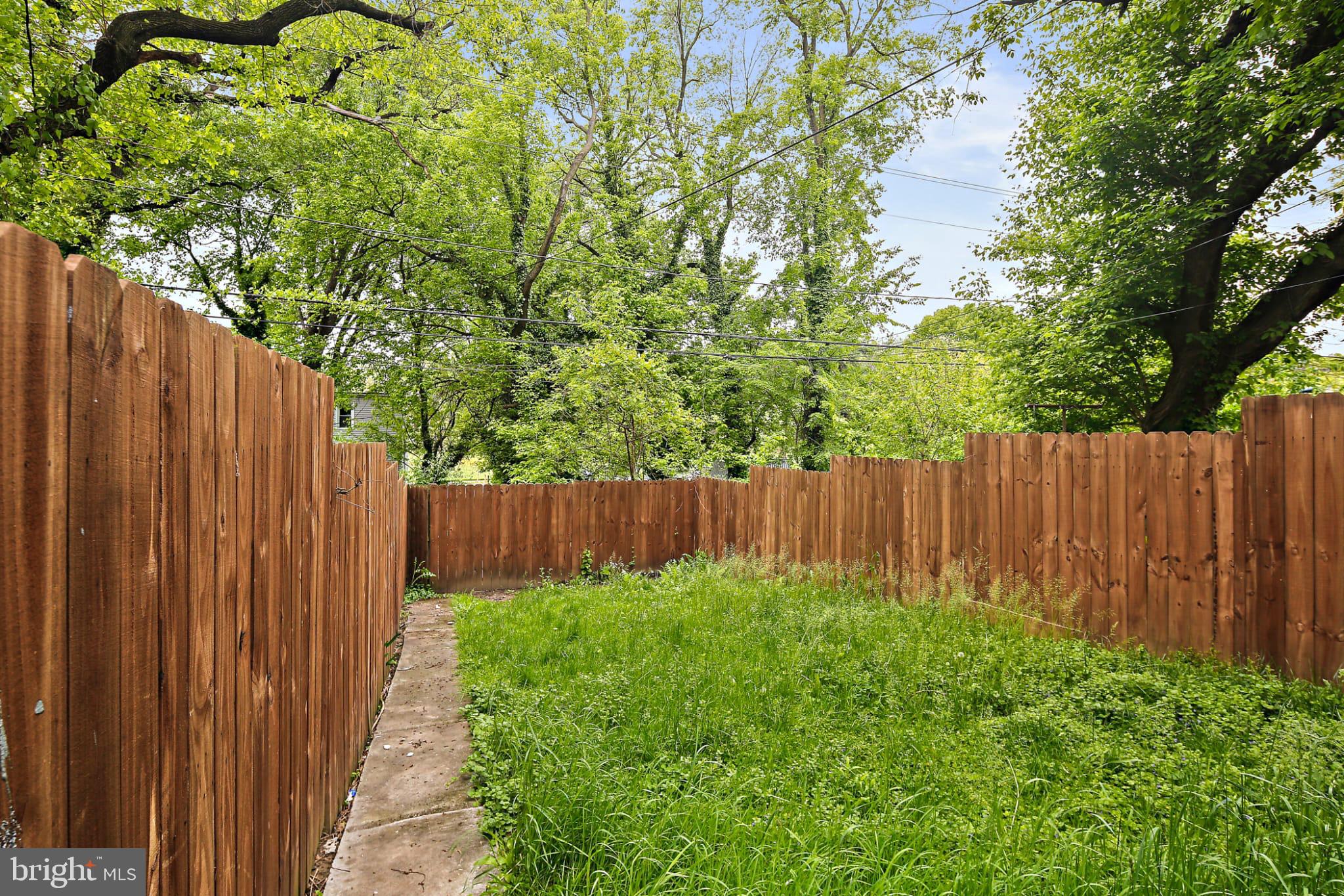 3924 Reisterstown Road Baltimore, MD 21215 - Photo 24 of 25 Lush, private yard surrounded by wooden fence.