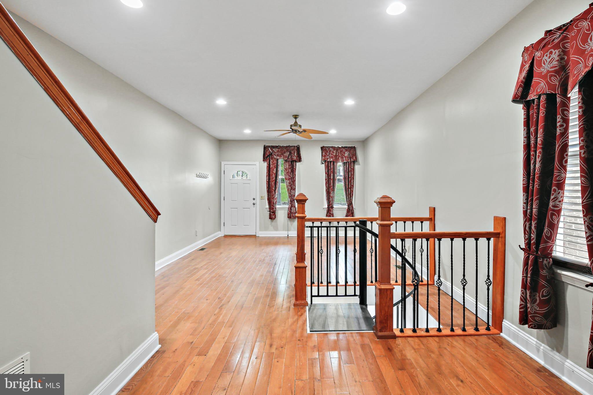 3924 Reisterstown Road Baltimore, MD 21215 - Photo 5 of 25 Spacious entryway with elegant wood accents.