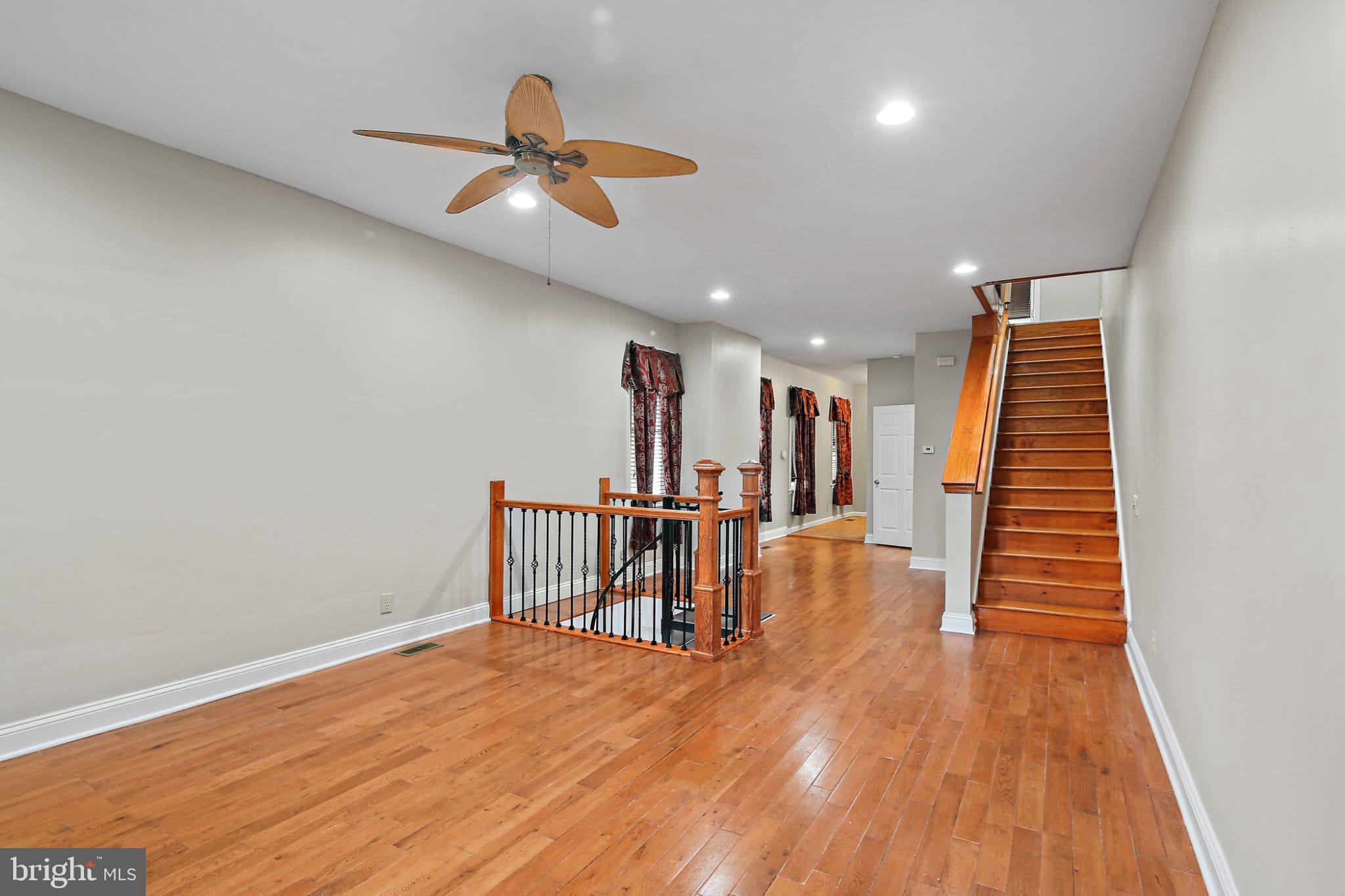 3924 Reisterstown Road Baltimore, MD 21215 - Photo 6 of 25 Spacious entryway with elegant wood accents.