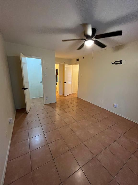 4460 Chaha Road, Unit 205 Garland, TX 75043 - Photo 19 of 27 a view of an empty room with a window