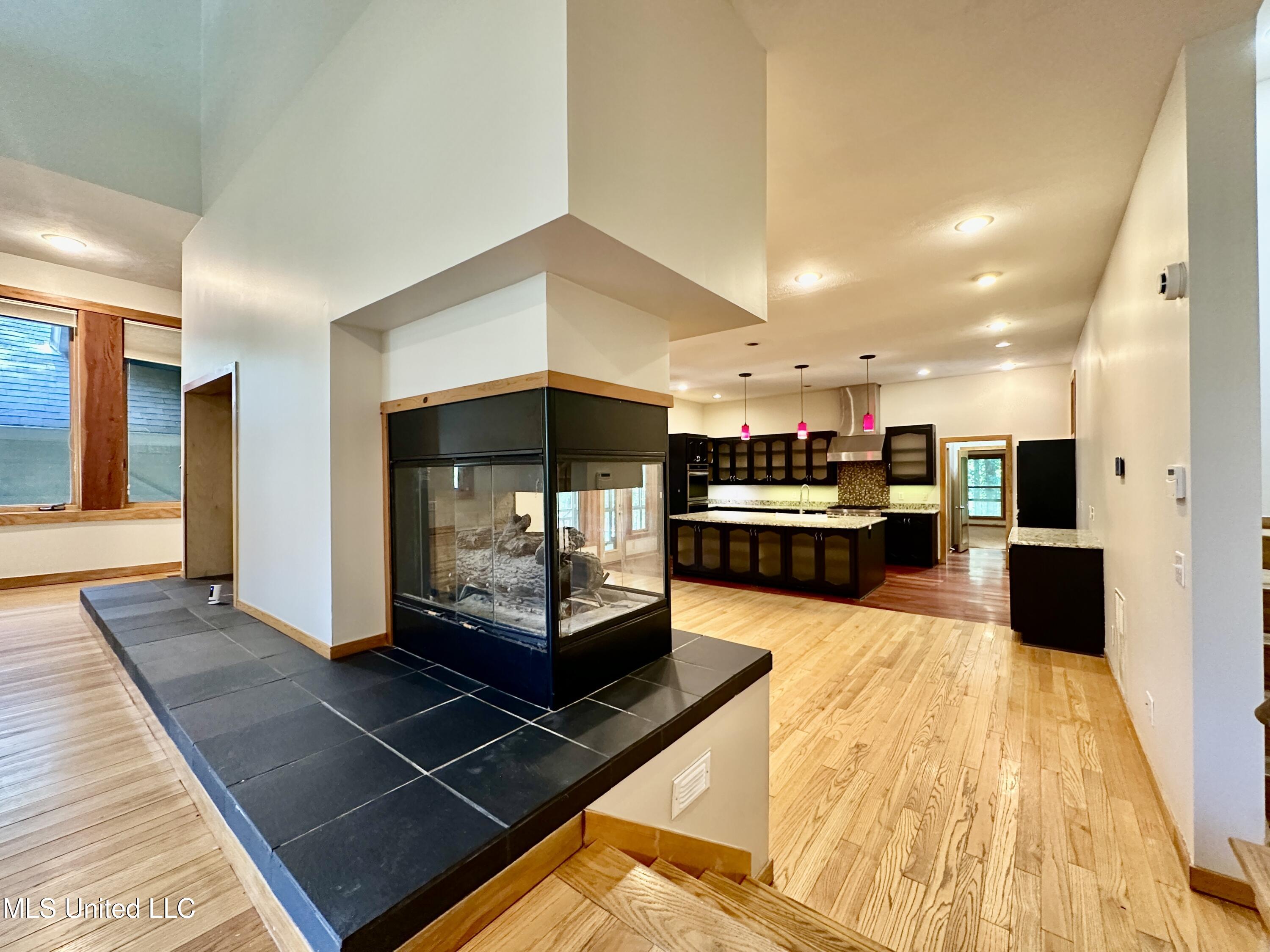 211 Monterey Drive Clinton, MS 39056 - Photo 14 of 62 family room to kitchen