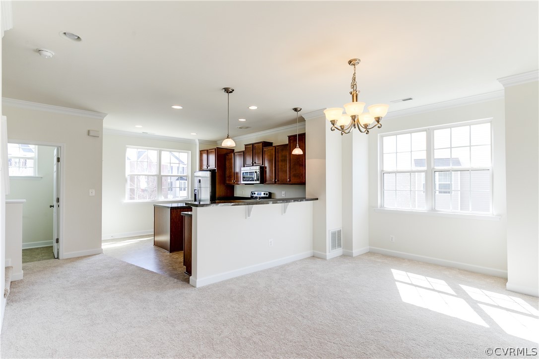 13346 Diamond Ridge Drive Midlothian, VA 23112 - Photo 15 of 42 a view of a kitchen with refrigerator and window