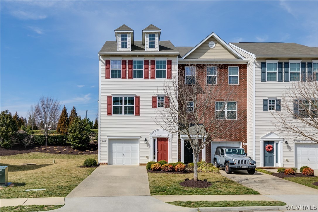 13346 Diamond Ridge Drive Midlothian, VA 23112 - Photo 3 of 42 a front view of a house with a yard
