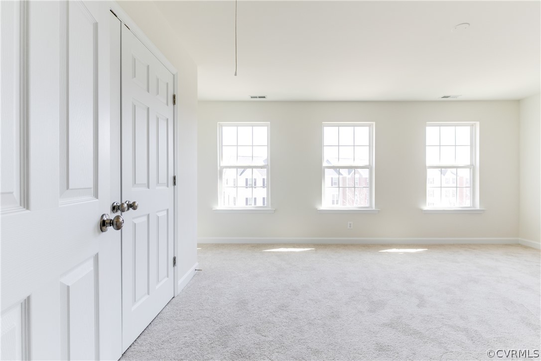 13346 Diamond Ridge Drive Midlothian, VA 23112 - Photo 31 of 42 a view of an empty room with a window
