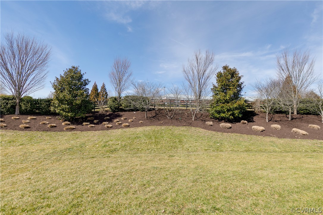 13346 Diamond Ridge Drive Midlothian, VA 23112 - Photo 36 of 42 a view of a swimming pool with an outdoor space and seating area