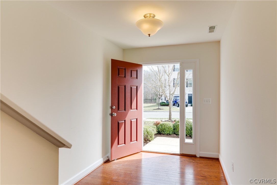 13346 Diamond Ridge Drive Midlothian, VA 23112 - Photo 4 of 42 a view of an entryway with wooden floor