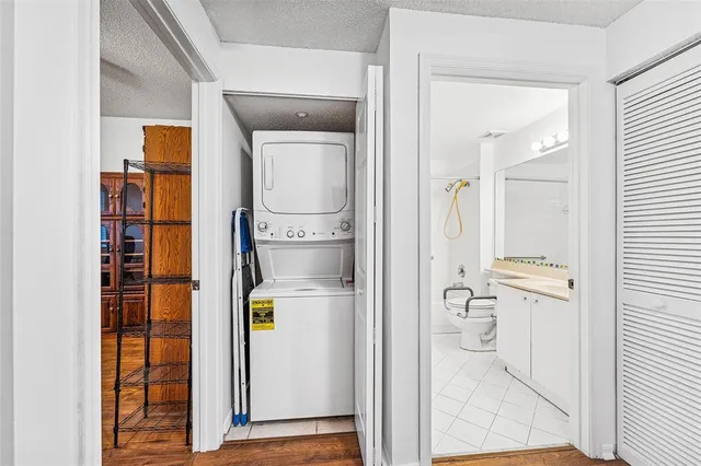 a view of hallway with washer and dryer