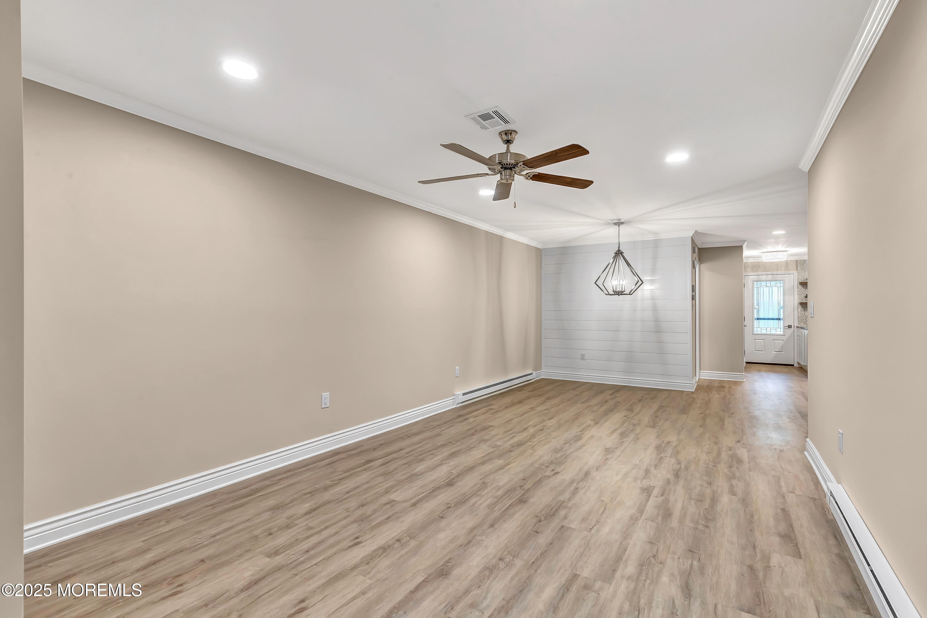 10 Ellsworth Court Red Bank, NJ 07701 - Photo 20 of 40 wooden floor in an empty room with a window