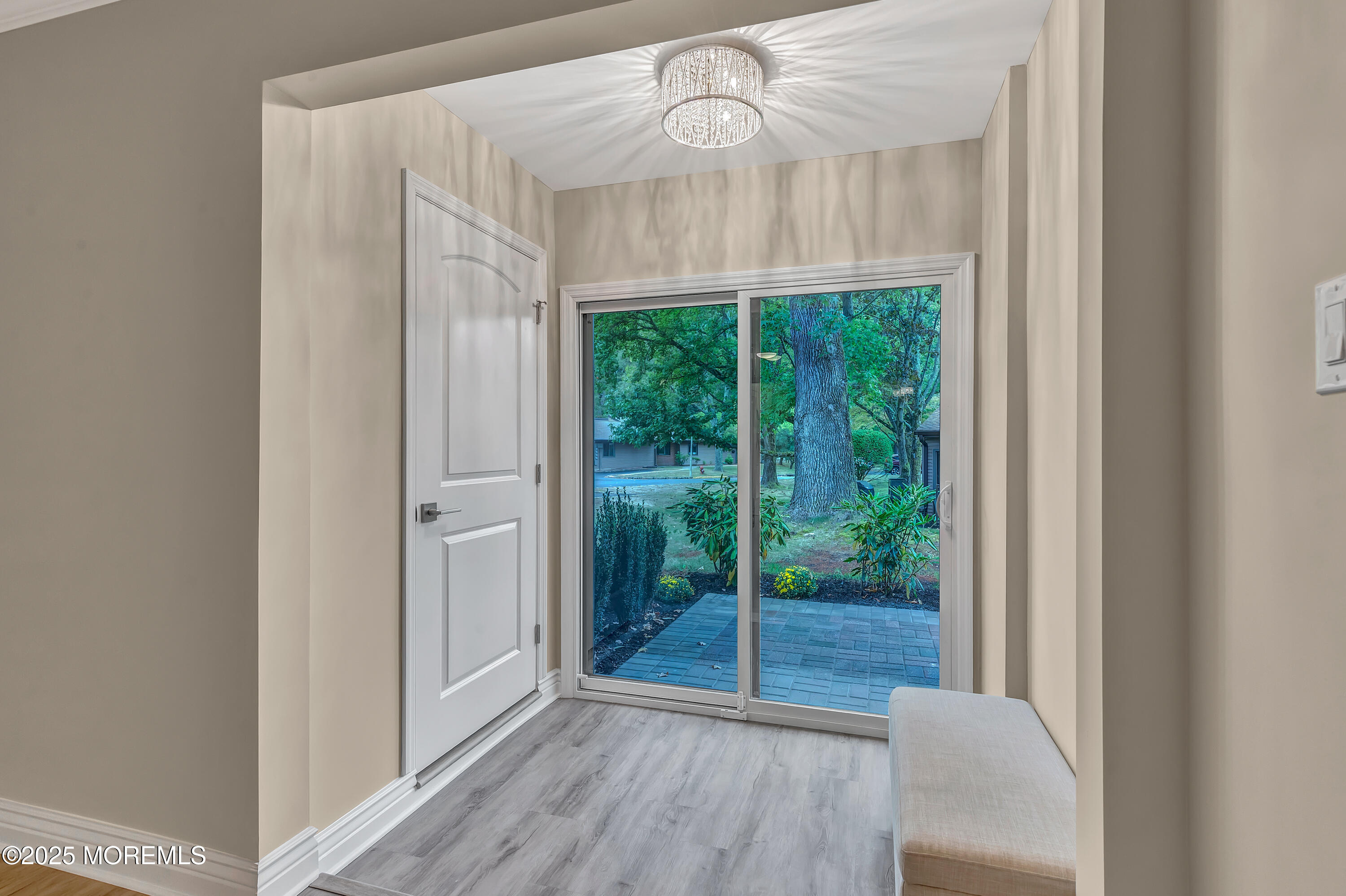 10 Ellsworth Court Red Bank, NJ 07701 - Photo 27 of 40 a view of a room with wooden floor fan and windows