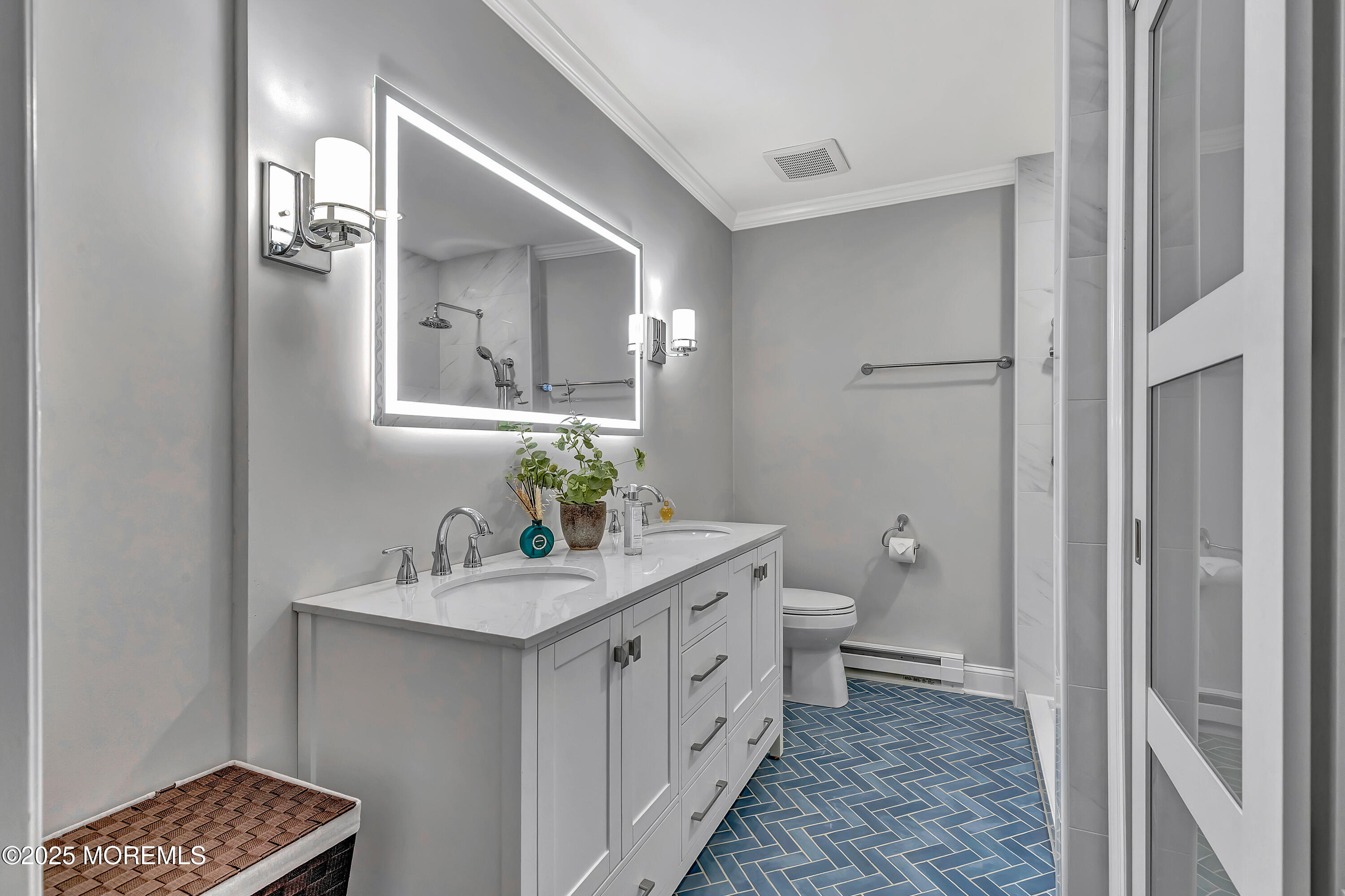 10 Ellsworth Court Red Bank, NJ 07701 - Photo 30 of 40 a bathroom with a double vanity sink a toilet and a mirror