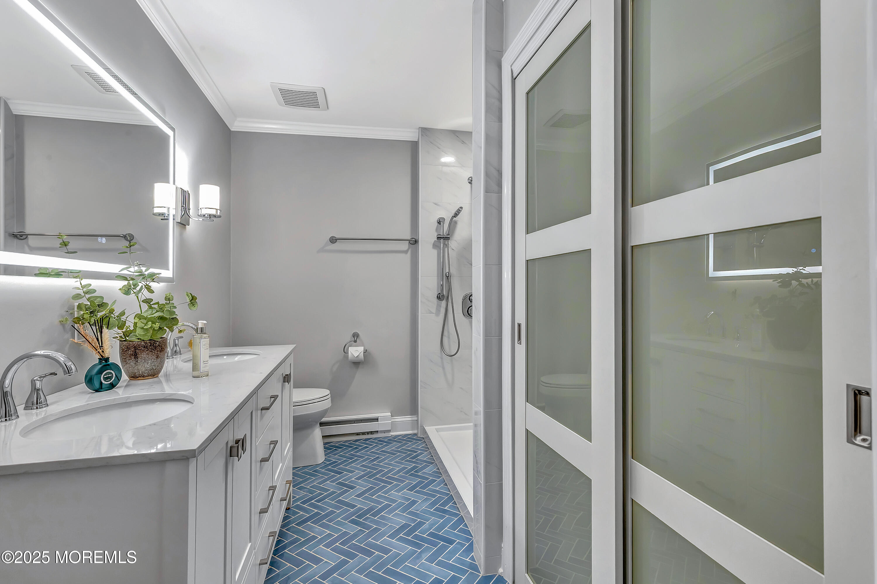 10 Ellsworth Court Red Bank, NJ 07701 - Photo 31 of 40 a bathroom with a granite countertop sink and a mirror